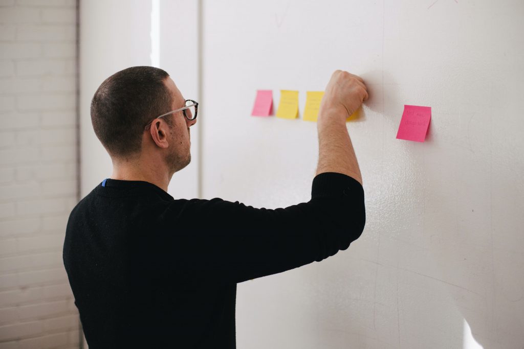 Man planning out for data visualization strategy for data storytelling